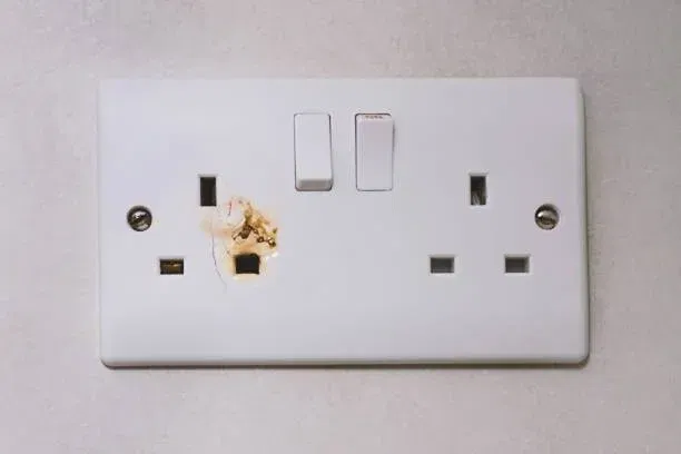 A Emergency electrician, repairs in Tooting, Balham proudly displays a lifelike design, with a plug, switch, and light switch at the ready. Set against a crisp white background, it stands out as a reliable, professional solution for Tooting and Balham emergencies.