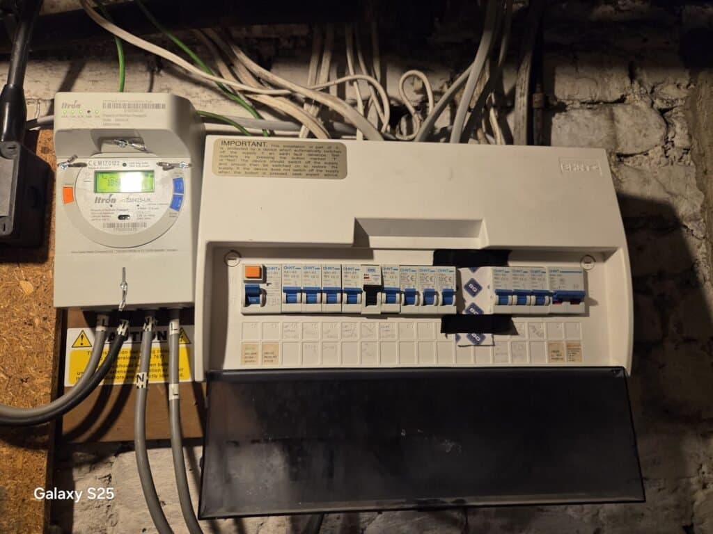 Failed EICR remedial works in Wimbledon showing consumer unit, smart meter and electrical installation inspected by BuildSpark electrician